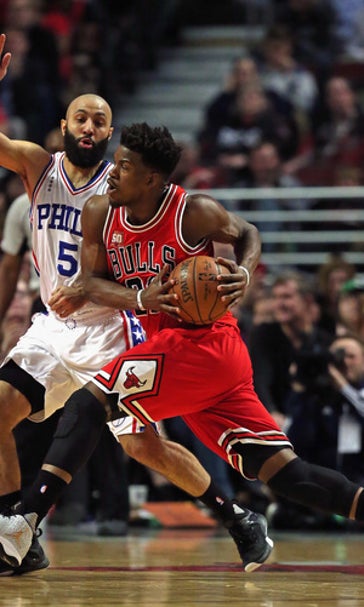 Bulls wipe out big early deficit, pound 76ers 115-105